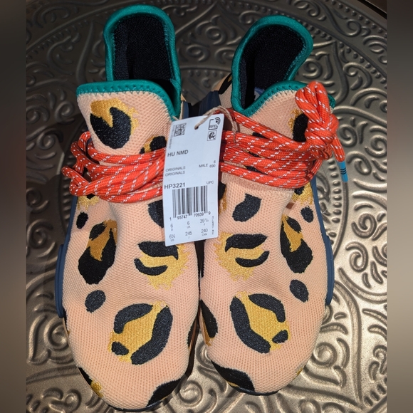 ADIDASNMD Hu Fred Flinstone x Pharrell Pulse Amber Size 6.5